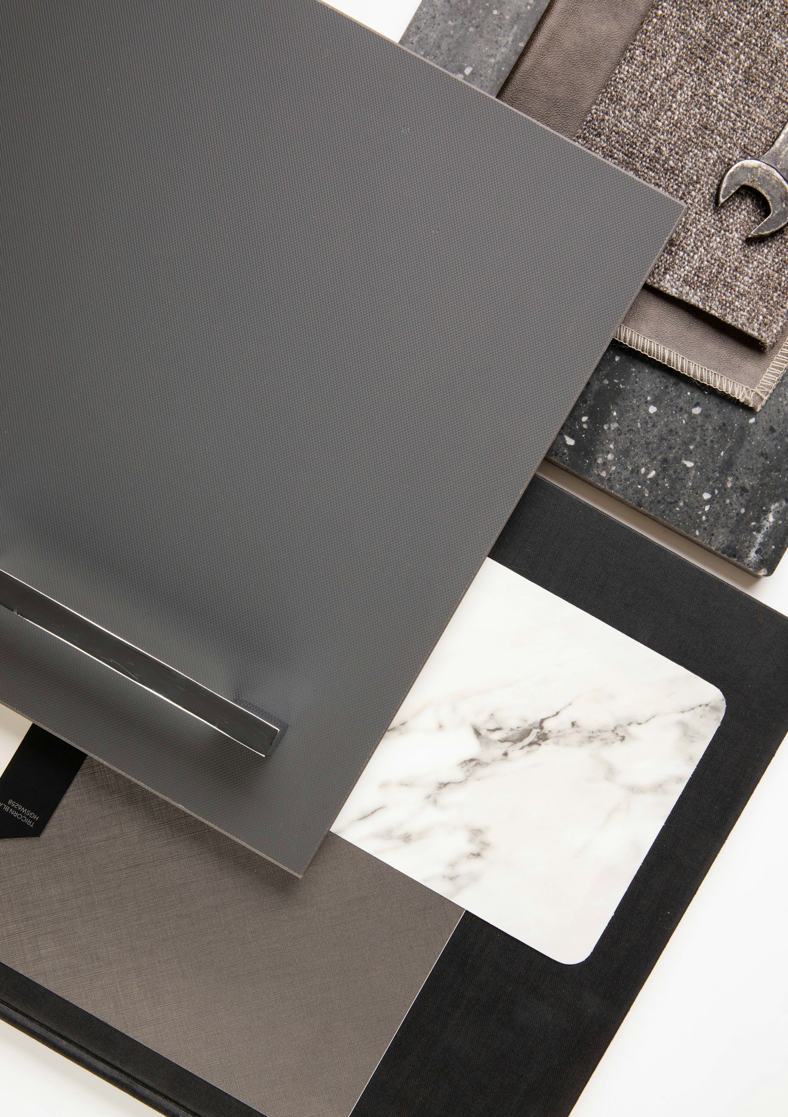Laminate, stone, fabric and hardware samples at Decora material store